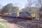 CSX 6457 with a ballast train 
